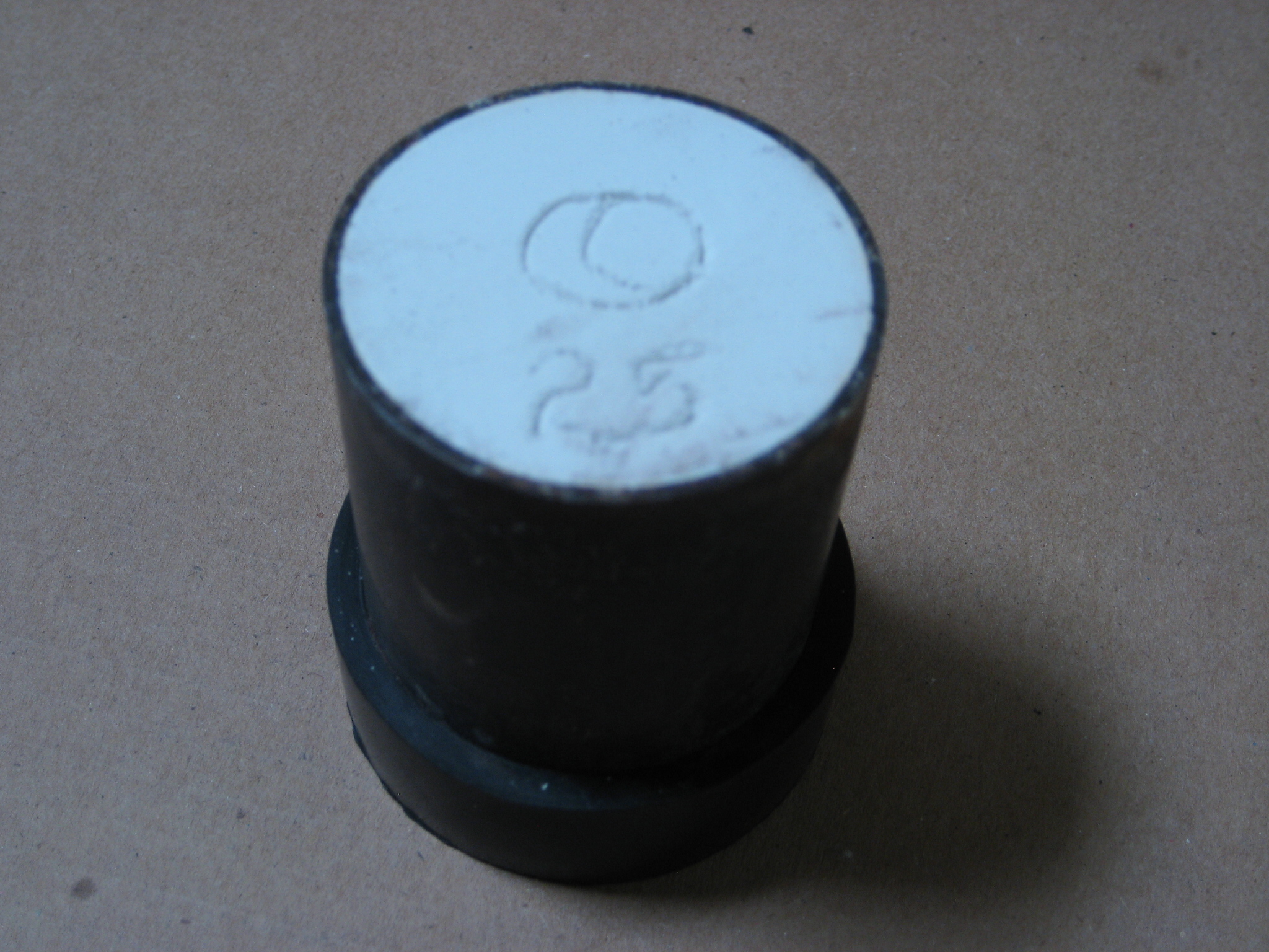 Casting image #4 An image of a wax model, invested in plaster and ready for the burn out