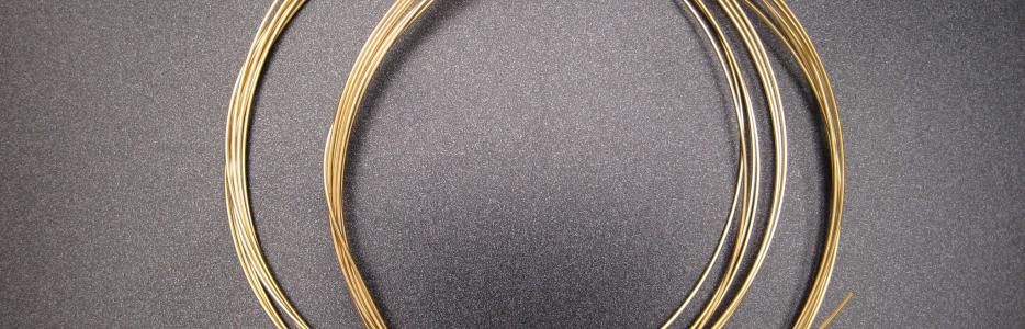 Spools of 18K gold wire after pulling and annealing.