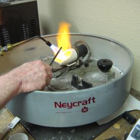 I am now heating the crucible with the fine gold.