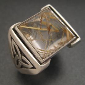 Celtic ring with custom cut rutilated quartz