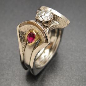 Custom wedding ring with diamond and rubies built as a modular ring.