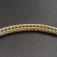 This is a detail of the handmade chain which forms the body of the neckpiece.